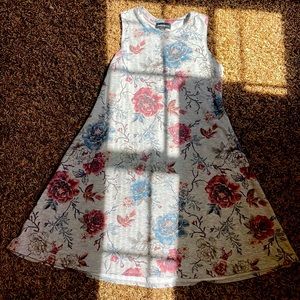 long grey floral dress made with 71% polyester 25% rayon and 4% spandex